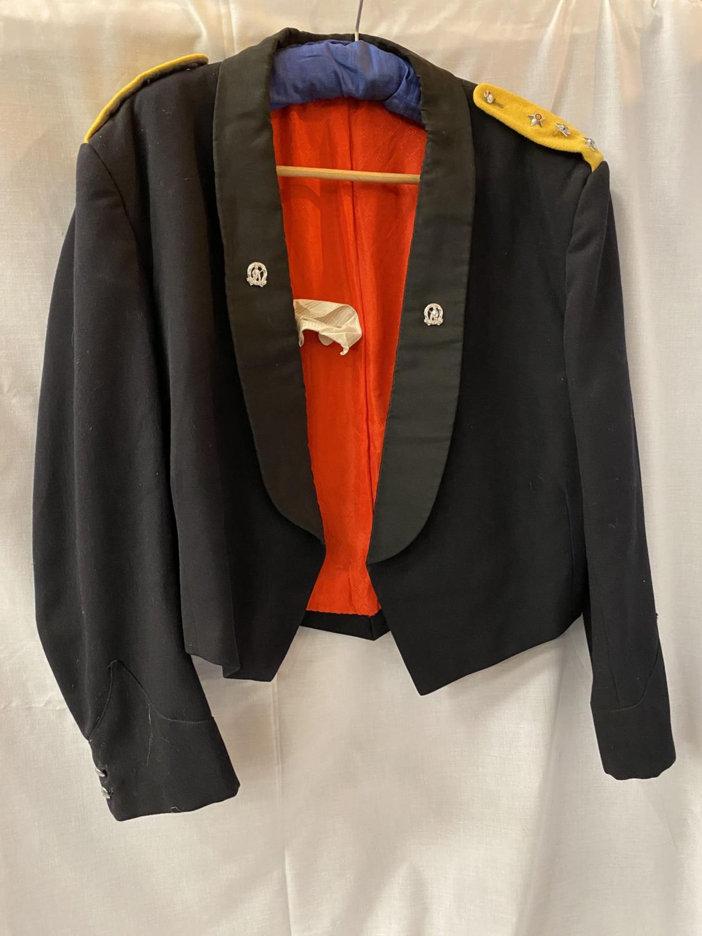 A SOUTH AFRICAN ARMY DINNER JACKET WITH EX UNITAS VIRES EMBLEMS