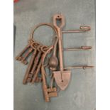 A VINTAGE METAL KEY HOOK WITH 6 LARGE KEYS AND A HOOK