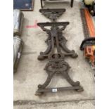 A PAIR OF HEAVY CAST IRON TABLE BASES