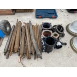 A LARGE QUANTITY OF PIPE BENDING SPRINGS AND AN ASSORTMENT OF PIPE COUPLINGS