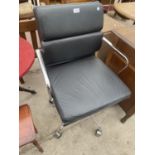 AN EAMES STYLES SWIVEL OFFICE ARM CHAIR AND CHROME BASE