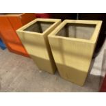 A PAIR OF YELLOW FIBRE GLASS PLANTERS (H:80CM)