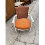 A 1950'S WHITE PAINTED LOW FIRESIDE CHAIR