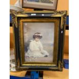 A VINTAGE FRAMED PICTURE OF A GIRL