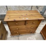 A MODERN PINE CHEST OF TWO SHORT AND TWO LONG DRAWERS, 32" WIDE