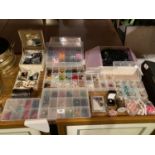 A LARGE COLLECTION OF MIXED BOXED COSTUME JEWELLERY AND BEADS FOR CRAFTING