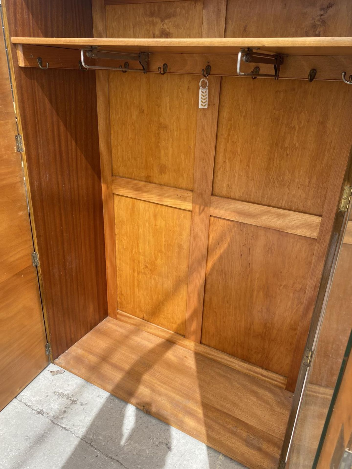 A SHINY WALNUT TWO DOOR WARDROBE - Image 2 of 2