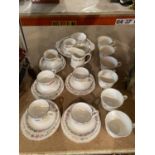 FIVE SETS OF OF PARAGON BELINDA TRIOS WITH SUGAR BOWL CREAMER AND SERVING PLATE. PLUS SIX