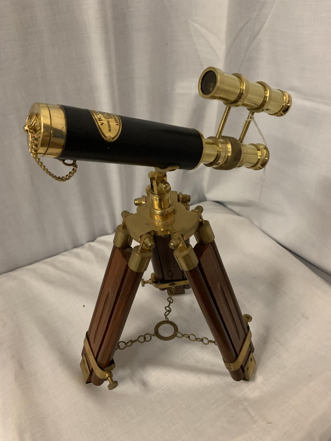 A BRASS AND LEATHER MARITIME TELESCOPE H:37CM