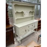 AN EARLY 20TH CENTURY OAK PAINTED DRESSER, 60" WIDE