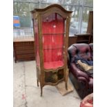 A LOUIS XVI STYLE WALNUT BOWFRONTED DISPLAY CABINET WITH PAINTED PANELS AND APPLIED GILT METAL