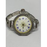 A SILVER LADIES WWI POCKET WATCH CONVERTED TO A WRISTWATCH DATED 1917