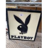 AN ILLUMINATED 'PLAYBOY' SIGN