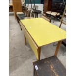 A VIVID YELLOW MID 20TH CENTURY SINGLE DROP-LEAF KITCHEN TABLE