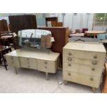 A RETRO LIMED OAK DRESSING TABLE AND MATCHING CHEST OF FOUR DRAWERS