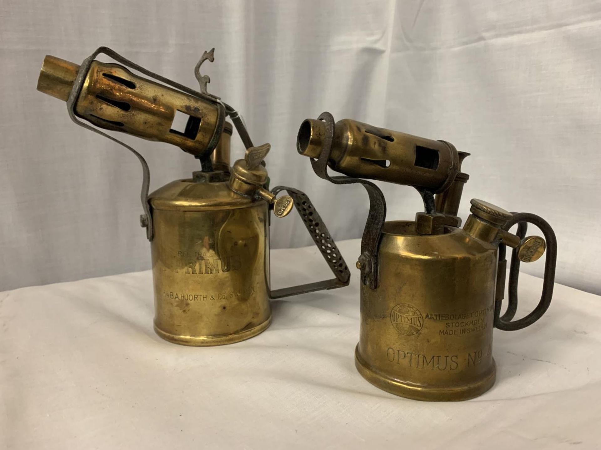 A PAIR OF VINTAGE BRASS BLOW TORCHES