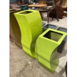 TWO CURVED GREEN FIBRE GLASS PALNTERS (H:120CM AND H:90CM)