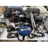 A LARGE QUANTITY OF CAMERA EQUIPMENT TO INCLUDE PRAKTICA SUPER TL1000 CAMERA, FURTHER CAMERAS AND