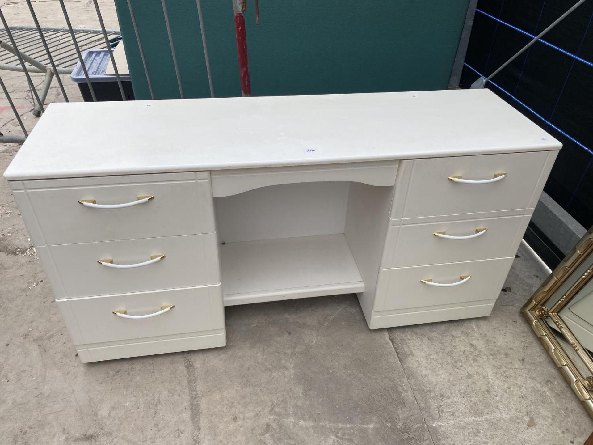 A MODERN WHITE DOUBLE PEDESTAL DRESSING TABLE