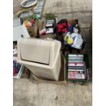 AN ASSORTMENT OF HOUSEHOLD CLEARANCE ITEMS TO INCLUDE DVDS, A BIN AND HATS ETC