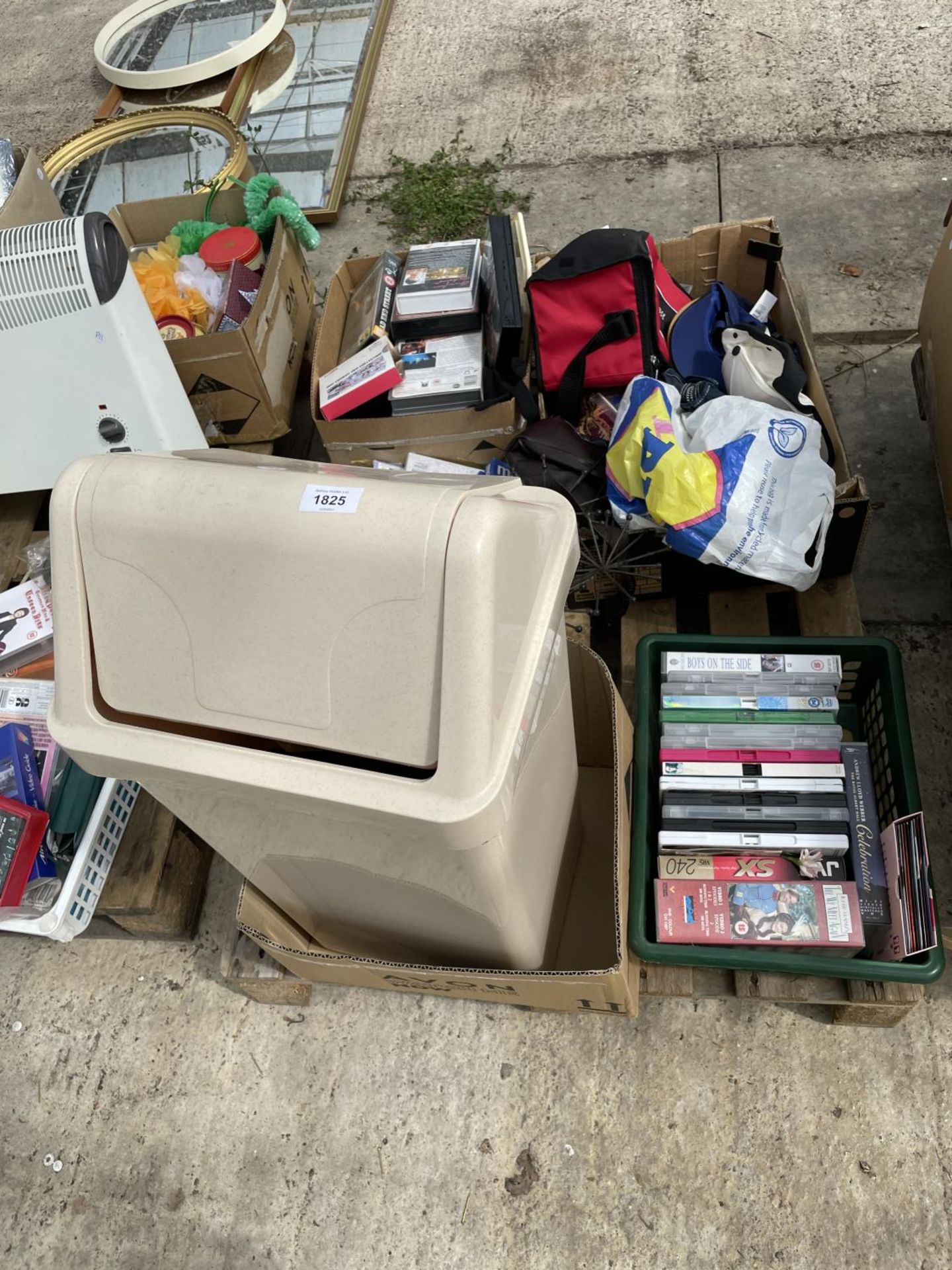 AN ASSORTMENT OF HOUSEHOLD CLEARANCE ITEMS TO INCLUDE DVDS, A BIN AND HATS ETC