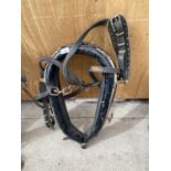 A VINTAGE HEAVY HORSE HEAD COLLAR