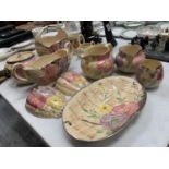A COLLECTION OF ARTHURWOOD FLORAL DESIGN JUGS AND DISPLAY BOWLS
