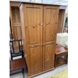 A MODERN TWO DOOR PINE WARDROBE, 34" WIDE