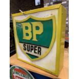 AN ILLUMINATED 'BP SUPER' SIGN
