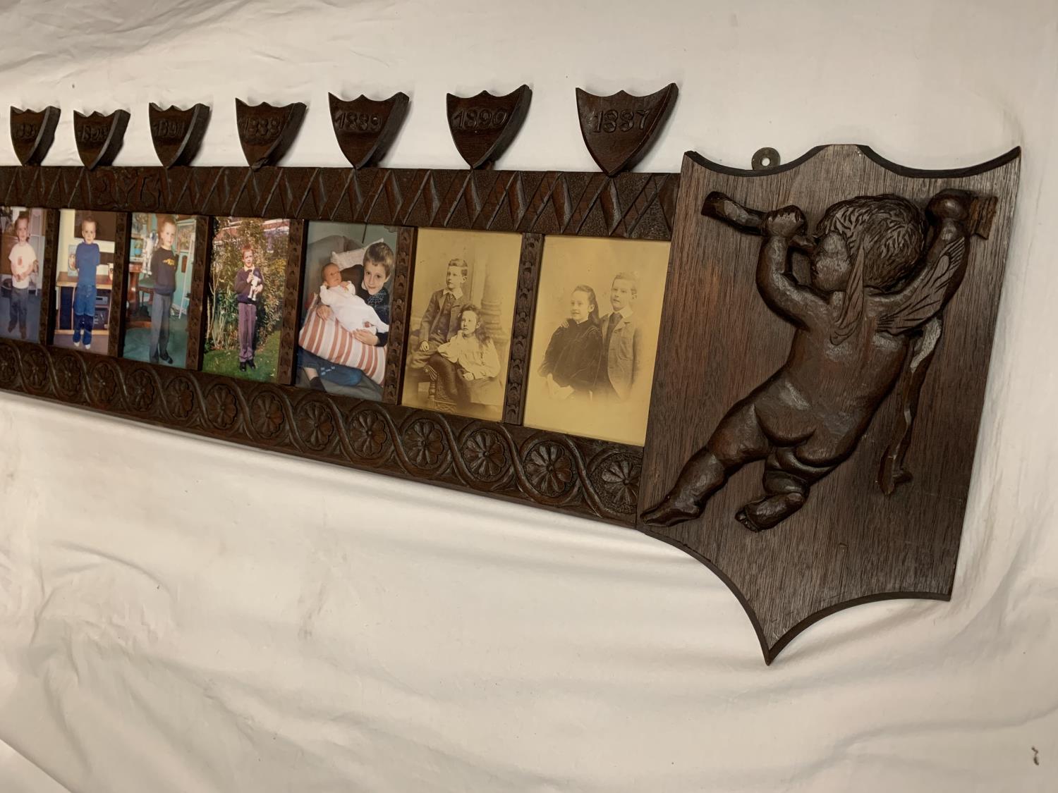 A VICTORIAN ORNATE WOODEN TEN PHOTO FRAME PANEL - Image 3 of 4