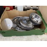 A LARGE ASSORTMENT OF STAINLESS STEEL KITCHEN ITEMS TO INCLUDE TRAYS AND FLAN DISHES ETC