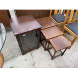 AN OAK NEST OF THREE TABLES AND STEREO CABINET