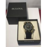 A NEW AND BOXED BOLOVA CALENDAR WRISTWATCH IN WORKING ORDER