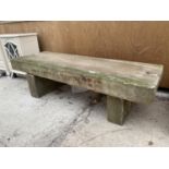 A STONE BENCH WITH PEDASTEL BASE