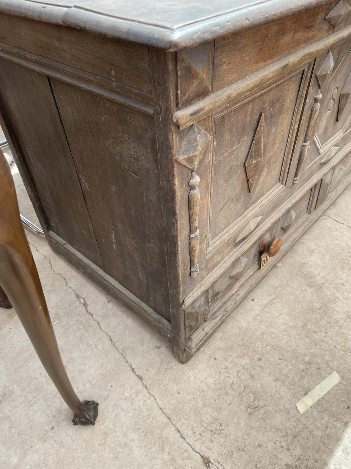 A GEORGE III OAK BLANKET CHEST WITH THREE PANEL FRONT BEARING INITIALS S.W AND DRAWER TO BASE, 50" - Image 4 of 5
