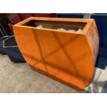 A CURVED ORANGE FIBRE GLASS PLANTER (H:90CM W:90CM)