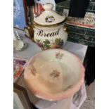 A LARGE LIDDED BREAD POT A/F HAIRLINE CRACK AND A BOWL