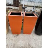 TWO LARGE ORANGE GARDEN PLANTERS