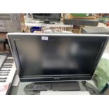 A 26" SONY TELEVISION WITH REMOTE CONTROL