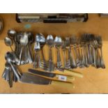 A LARGE QUANTITY OF FLATWARE INCLUDING SERVERS