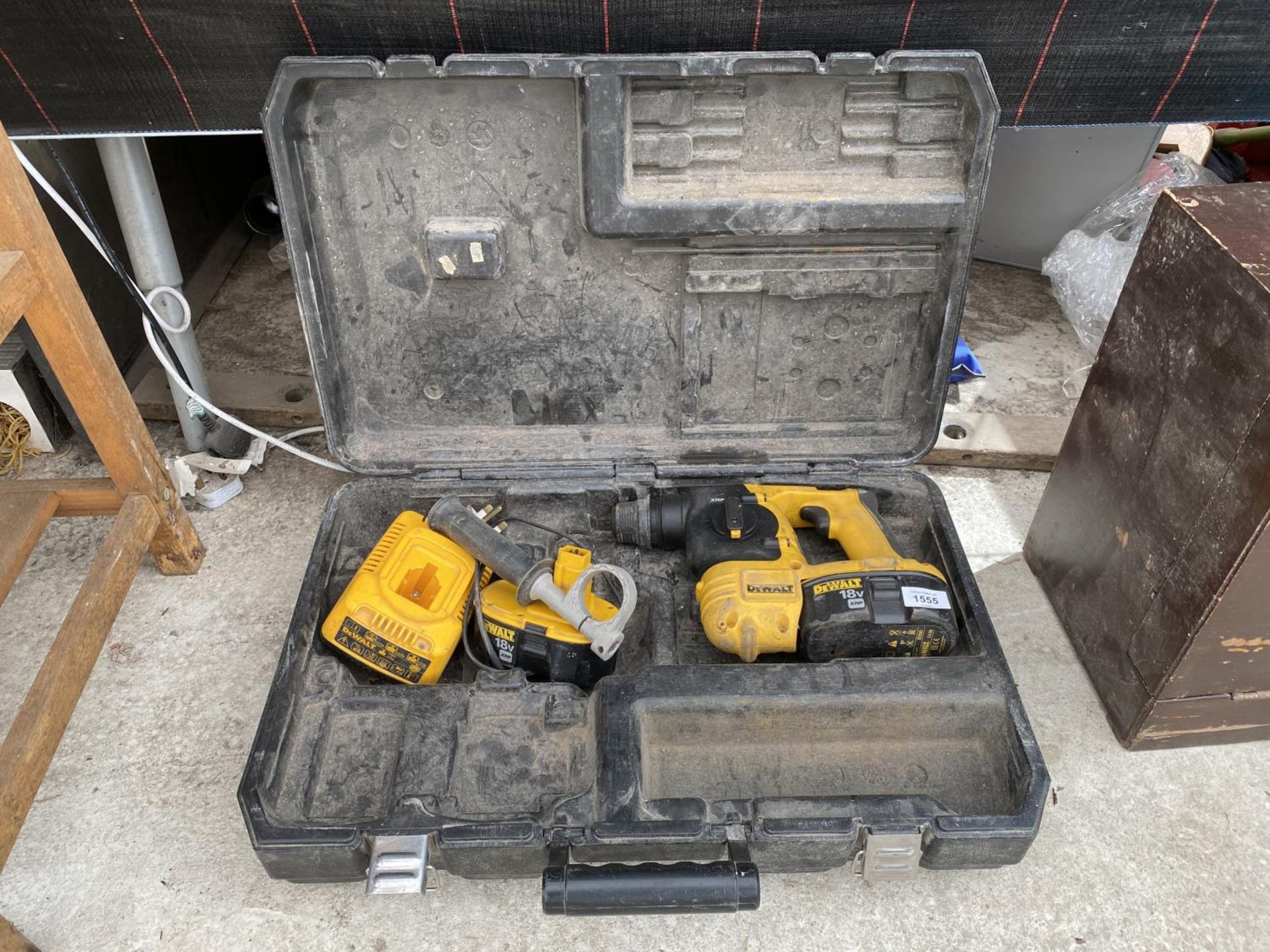 A DEWALT 18V SDS DRILL WITH CHARGER AND EXTRA BATTERY