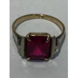 A 9 CARAT GOLD ART DECO RING WITH ARTIFICIAL RUBY