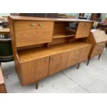 A RETRO TEAK SIDEBOARD CABINET WITH TWO LOWER DOORS AND DRAWERS AND THREE UPPER DOORS