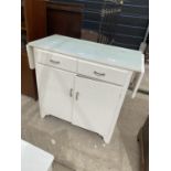 A MID 20TH CENTURY KITCHEN SIDE CABINET WITH DROP-LEAVES