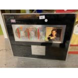 A FRAMED MICHAEL BOLTON PRSENTATION PICTURE RECOGNISING SALES FOR MORE THAN 900,000 COPIES