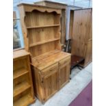 A MODERN PINE DRESSER COMPLETE WITH PLATE RACK, 36" WIDE