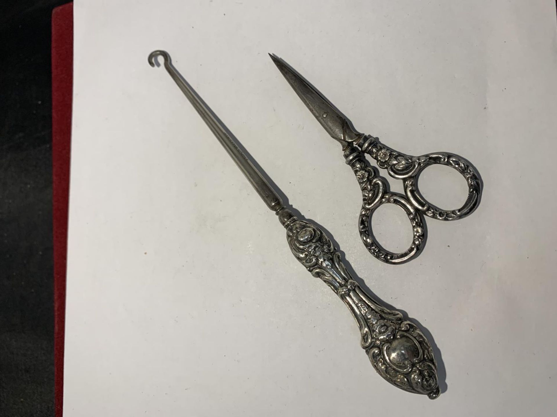 A SILVER HANDLED BUTTON HOOK AND A PAIR OF SILVER HANDLED SISSORS - Image 2 of 2