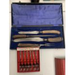 A VINTAGE BOXED MEAT CARVING SET AND SIX BOXED COMMUNITY PLATE CAKE FORKS