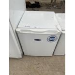 A WHITE ICEKING COUNTER TOP FRIDGE BELIEVED WORKING BUT NO WARRANTY
