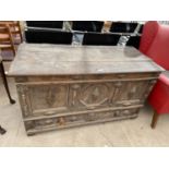 A GEORGE III OAK BLANKET CHEST WITH THREE PANEL FRONT BEARING INITIALS S.W AND DRAWER TO BASE, 50"